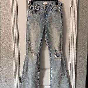 MOTHER Light Blue Flare Jeans with Distressed Details